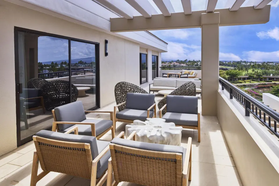 Palace Presidential Suite terrace seating with ocean view at Hilton Waikoloa Village.