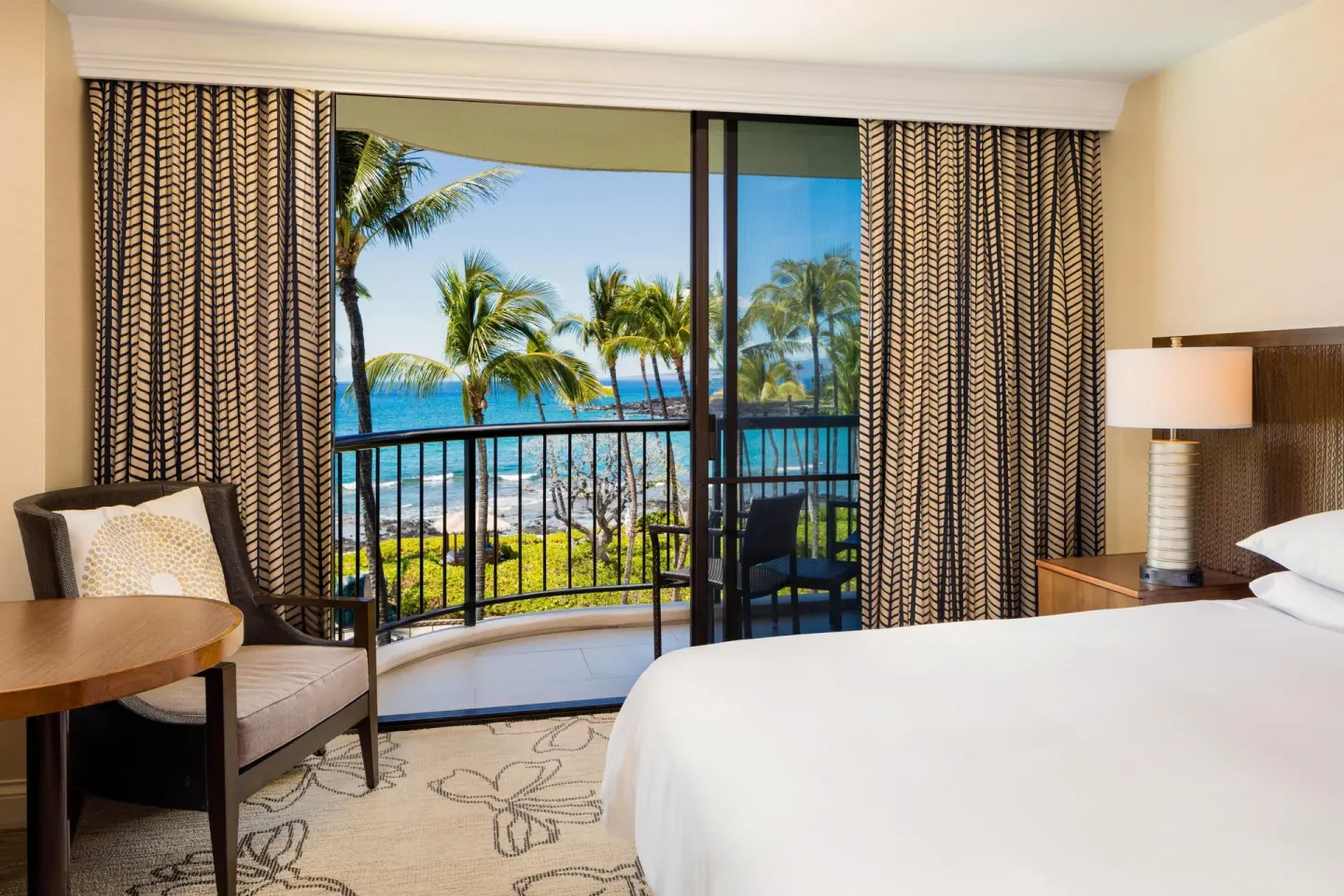 Accessible Makai ocean view room with king bed and balcony at Hilton Waikoloa Village.