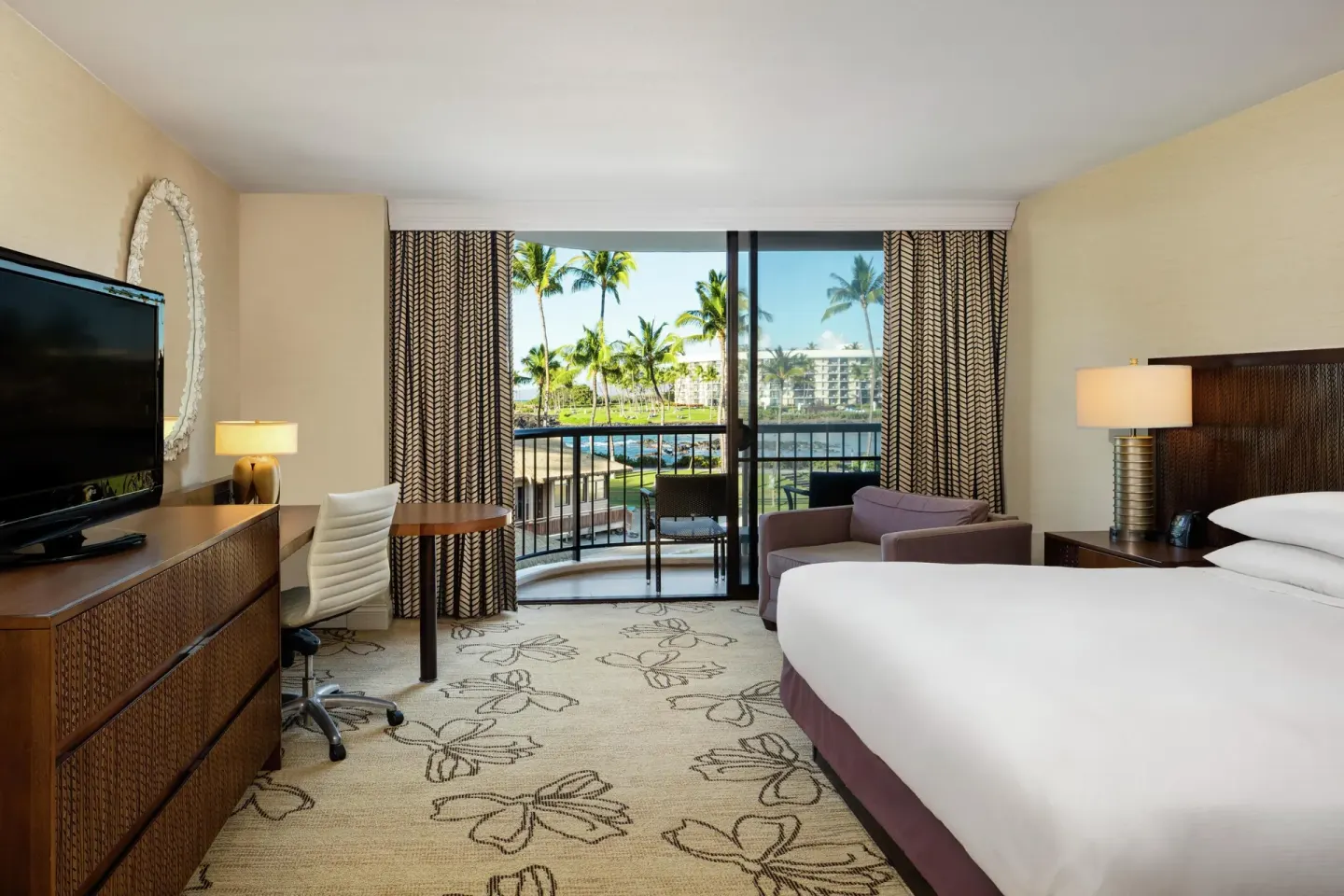 Accessible resort view king room with balcony at Hilton Waikoloa Village.