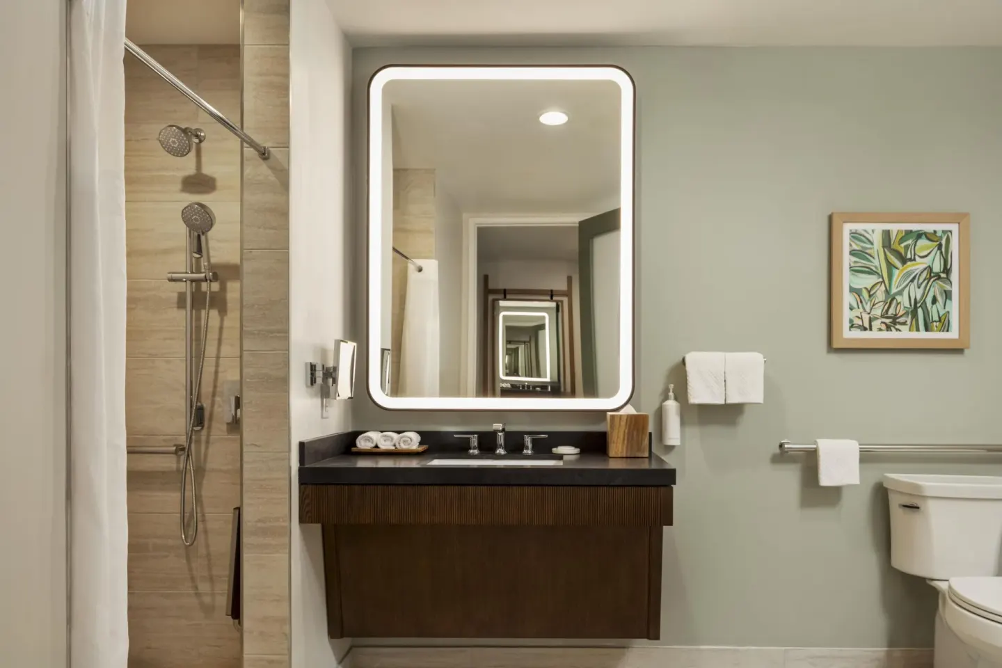 Accessible bathroom with roll-in shower at Hilton Waikoloa Village.