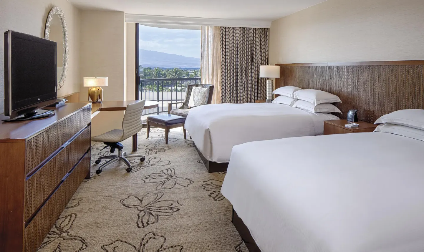 Accessible resort view room with two beds and balcony at Hilton Waikoloa Village.
