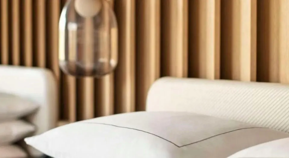 Close-up of the renovated Ocean View Palace bed and headboard at Hilton Waikoloa Village.