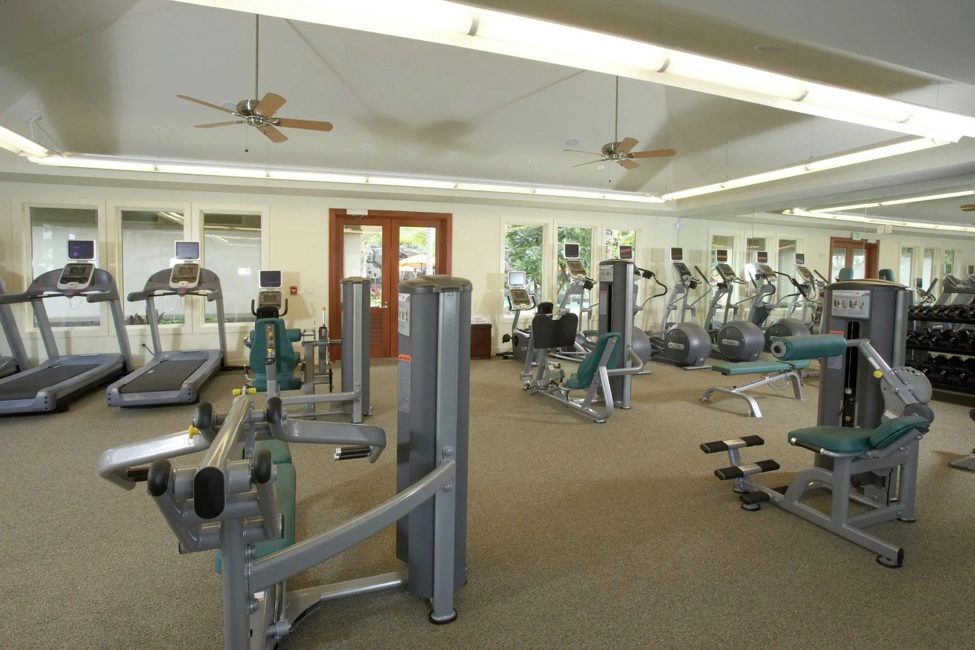 Fitness center with cardio machines and strength equipment at Ho‘olei Villas at Grand Wailea.