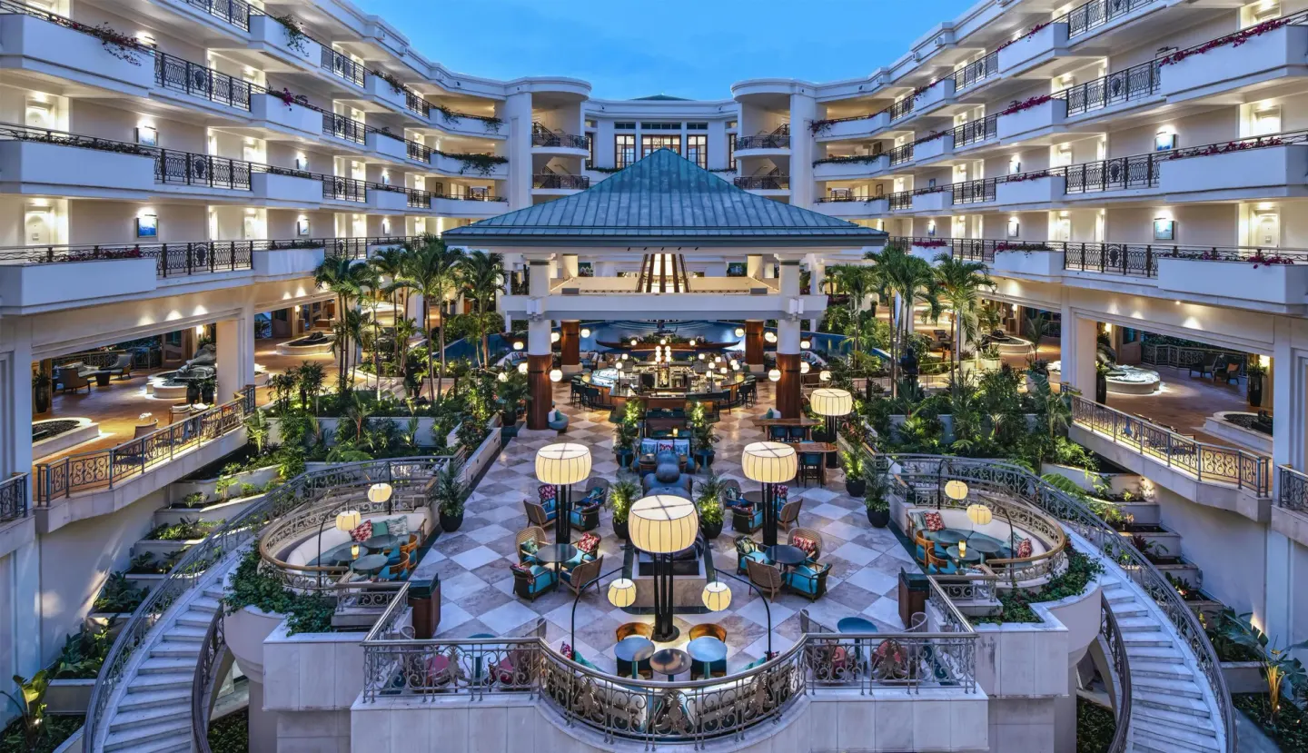 Open atrium lounge with terraces and seating at Ho‘olei Villas at Grand Wailea.
