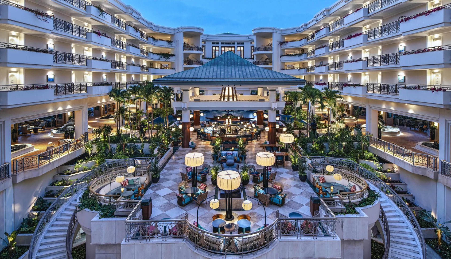 Open atrium lounge with terraces and seating at Ho‘olei Villas at Grand Wailea.