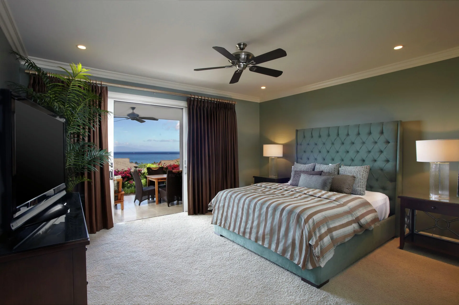 Ocean-view bedroom with king bed and lanai at Ho‘olei Villas at Grand Wailea.