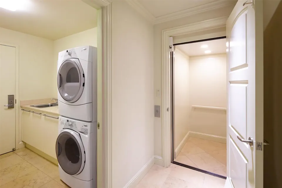 Laundry room and elevator entry in a luxury villa at Ho‘olei Villas at Grand Wailea.