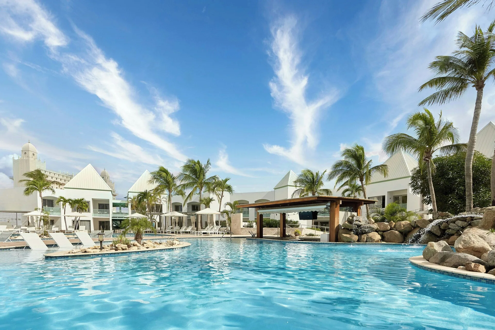 Courtyard Aruba resort near Palm Beach with modern rooms lagoon pool and relaxed island atmosphere