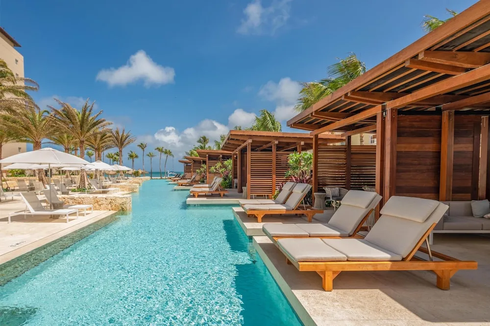 Hyatt Regency Aruba Palm Beach resort and casino with tropical pools gardens and beachfront setting