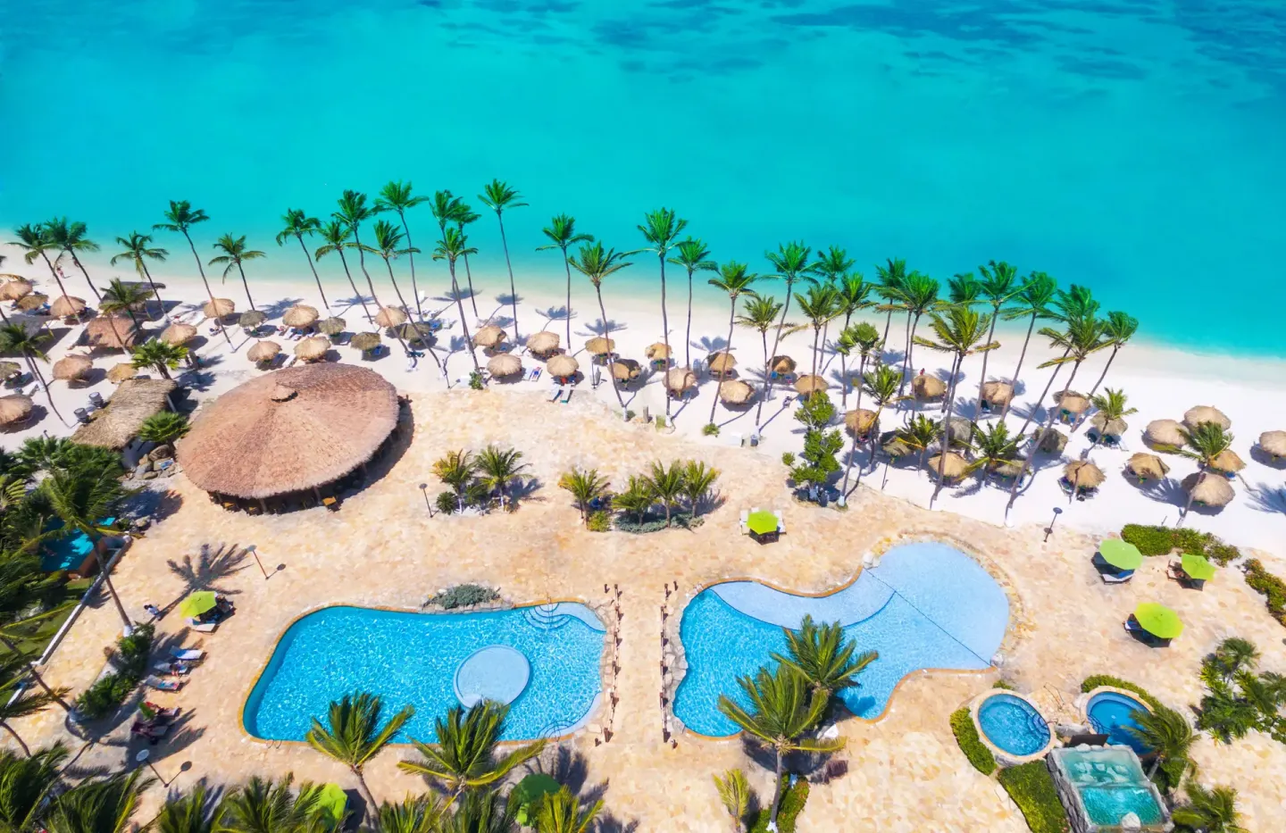 Aerial pools beside the beach at Holiday Inn Resort Aruba - Beach Resort & Casino.