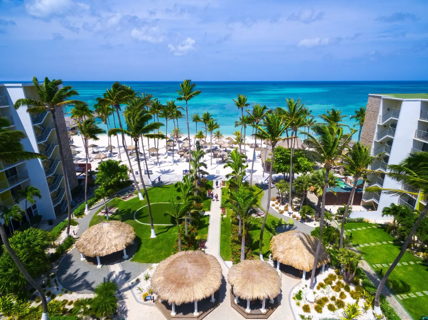 Oceanfront resort grounds and beach at Holiday Inn Resort Aruba - Beach Resort & Casino.