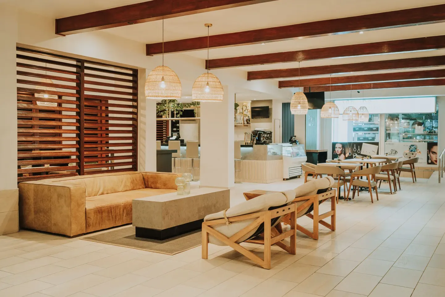 Lobby café seating and counter at Holiday Inn Resort Aruba - Beach Resort & Casino.