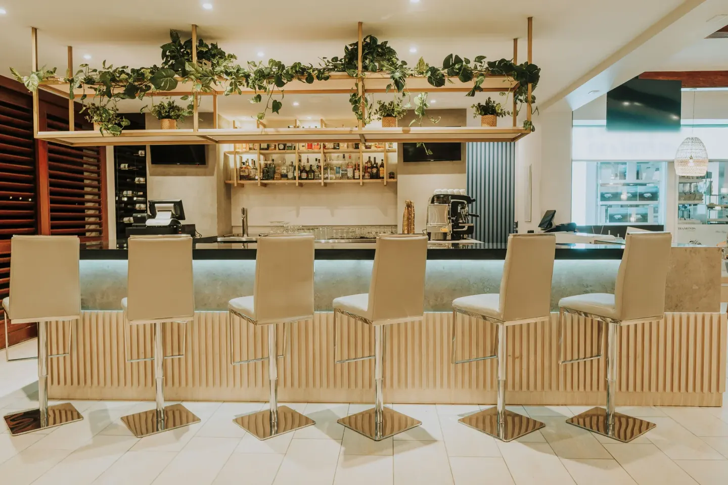 Palm Lobby Bar & Café counter seating at Holiday Inn Resort Aruba - Beach Resort & Casino.