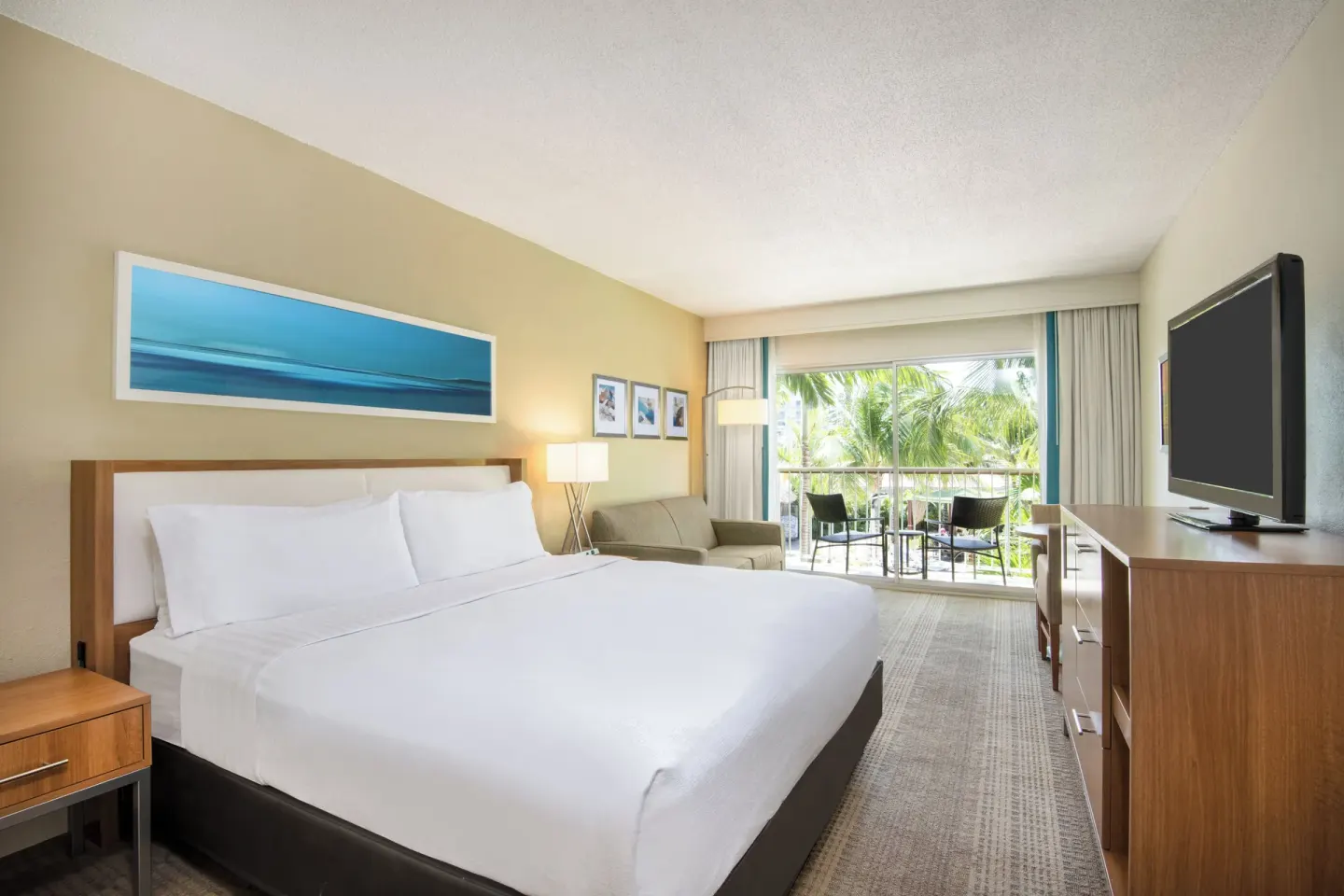 Premium Room king bed with balcony view at Holiday Inn Resort Aruba - Beach Resort & Casino.