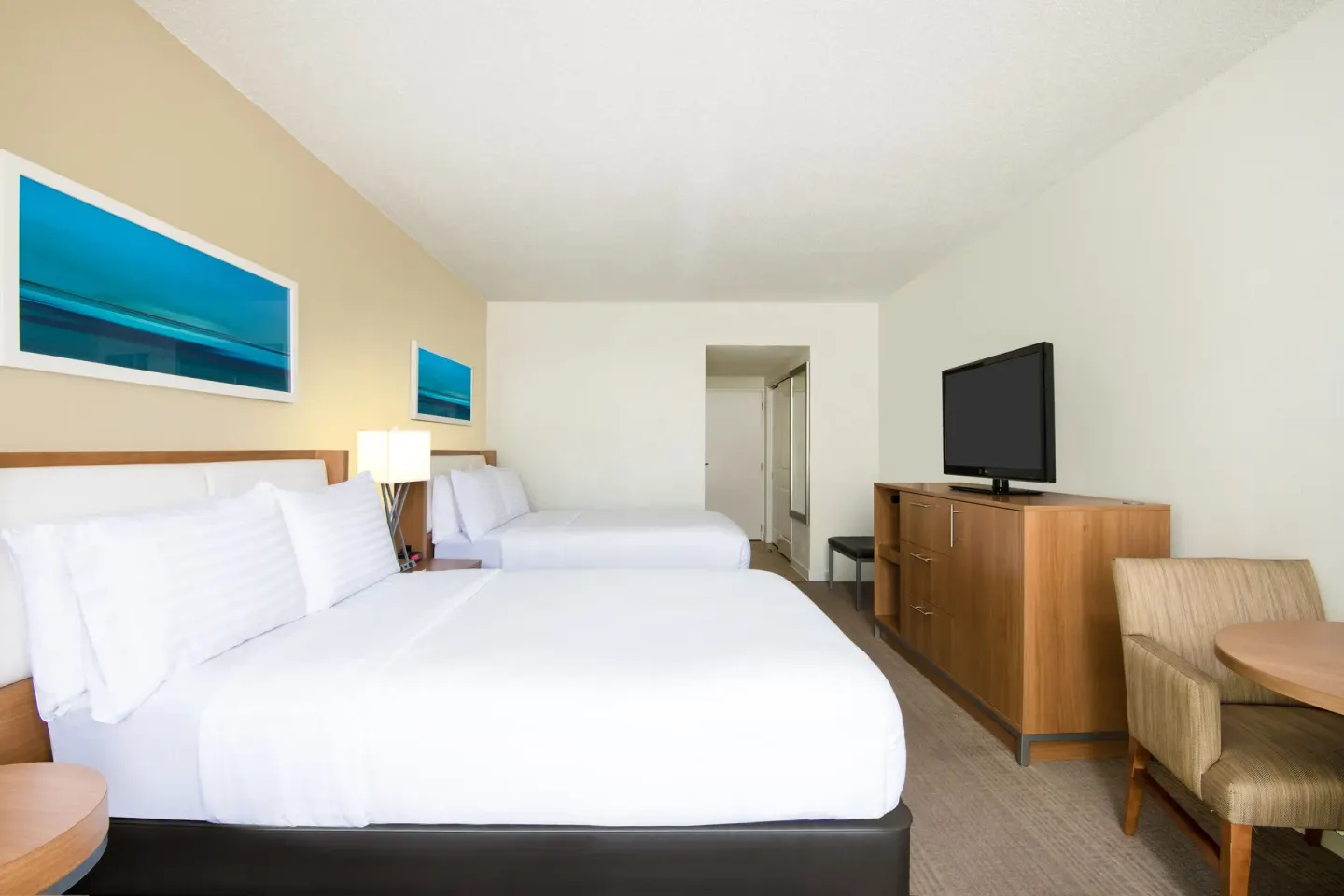 Premium Room with two beds and seating at Holiday Inn Resort Aruba - Beach Resort & Casino.