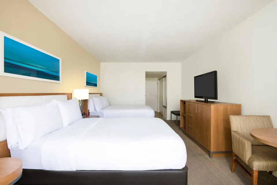 Premium Room with two beds and seating at Holiday Inn Resort Aruba - Beach Resort & Casino.