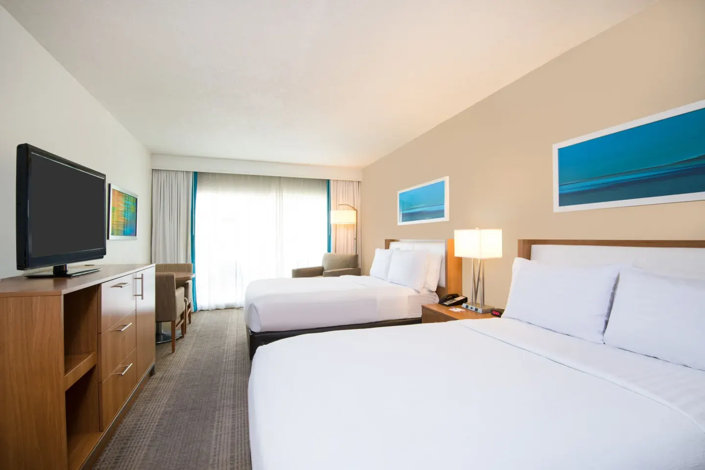 Premium Room with two beds and TV dresser at Holiday Inn Resort Aruba - Beach Resort & Casino.
