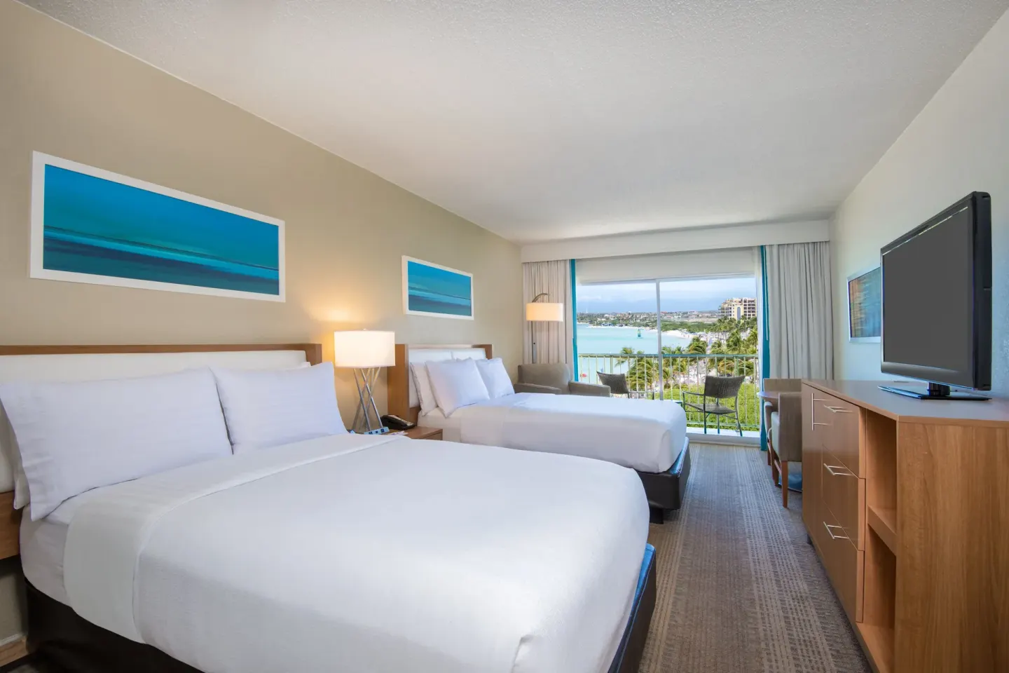 Standard Partial Ocean View room with two beds at Holiday Inn Resort Aruba - Beach Resort & Casino.
