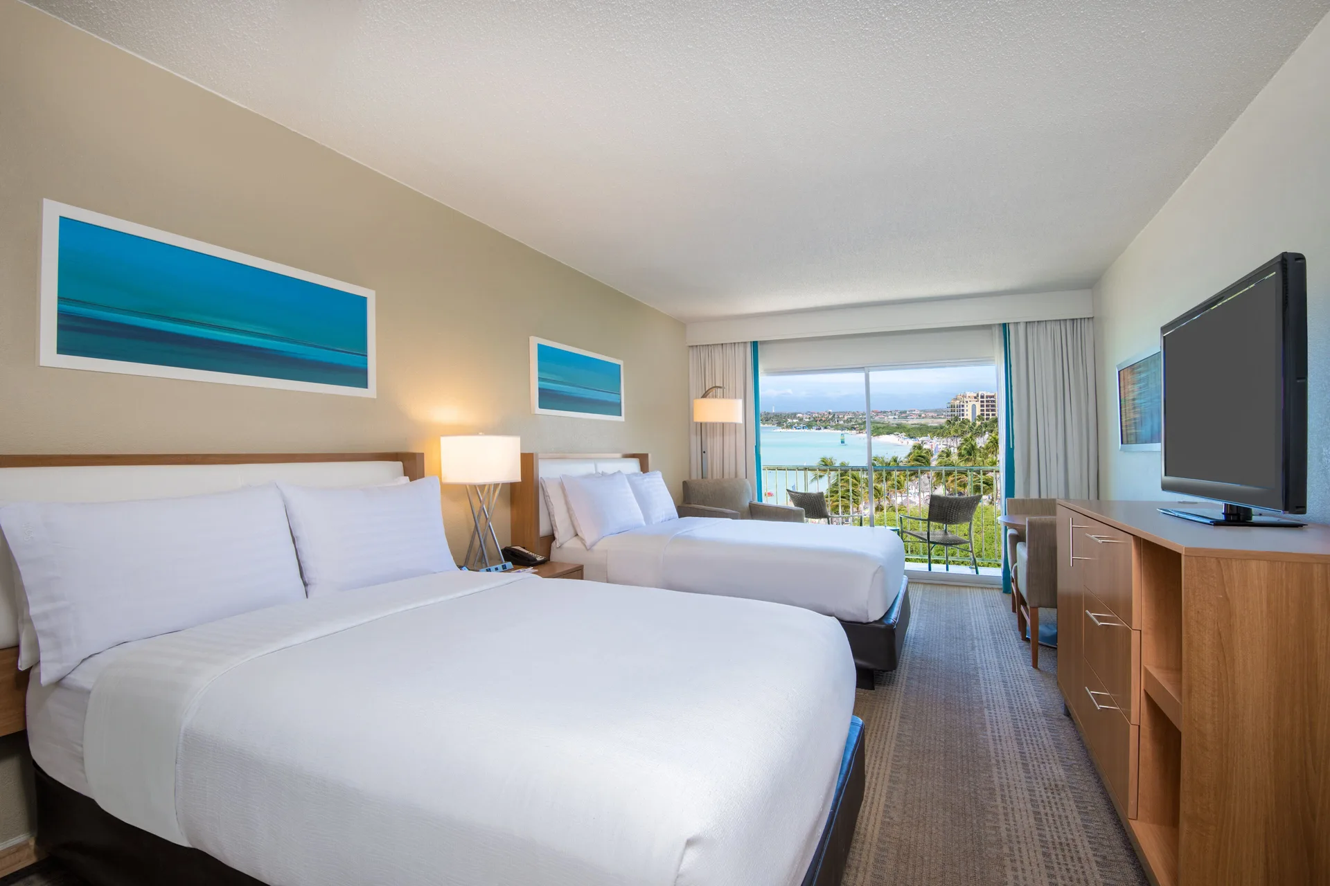 Standard Partial Ocean View room with two beds at Holiday Inn Resort Aruba - Beach Resort & Casino.