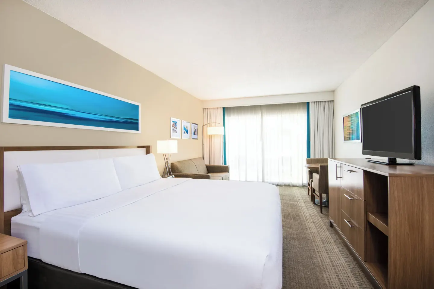 Standard Room with king bed and TV at Holiday Inn Resort Aruba - Beach Resort & Casino.