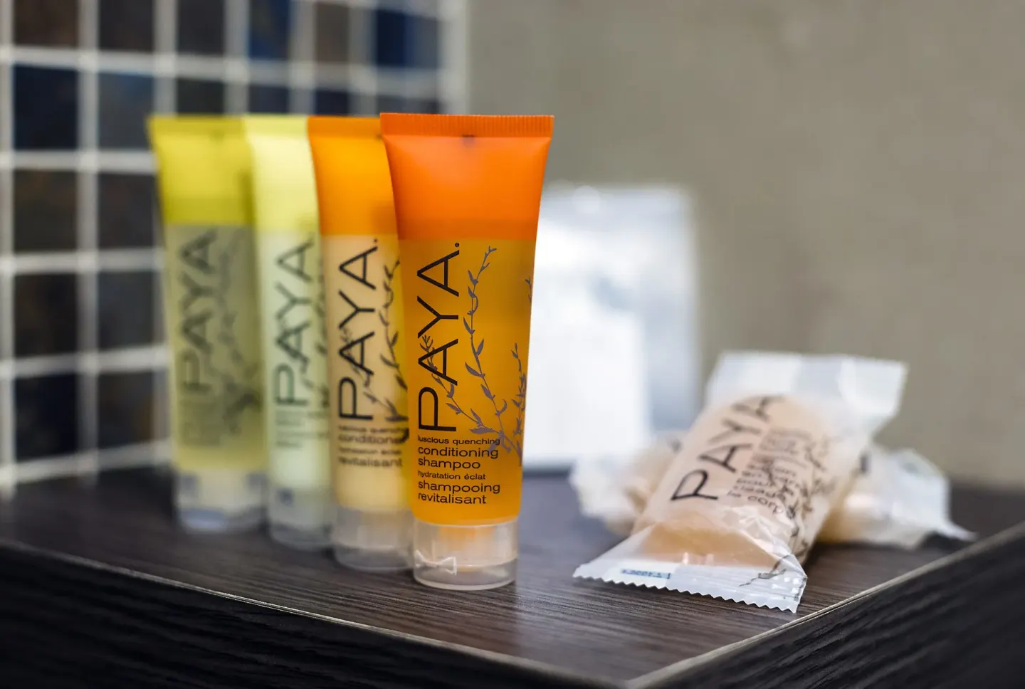 Bathroom toiletries arranged on a tray at Holland House Beach Hotel.