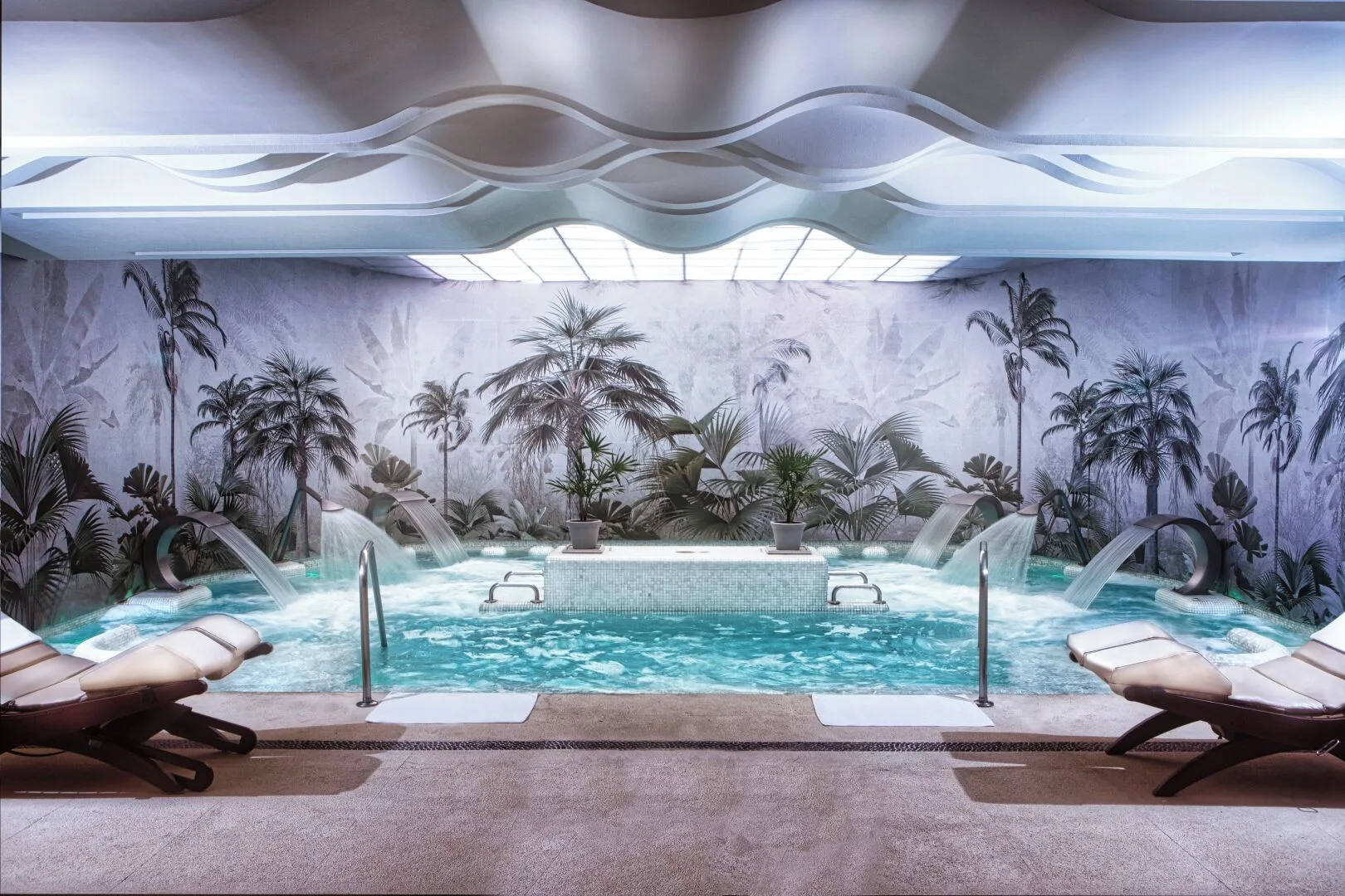 Hydrotherapy pool with water jets and loungers at Hotel Azul Ixtapa Grand Resort Spa.