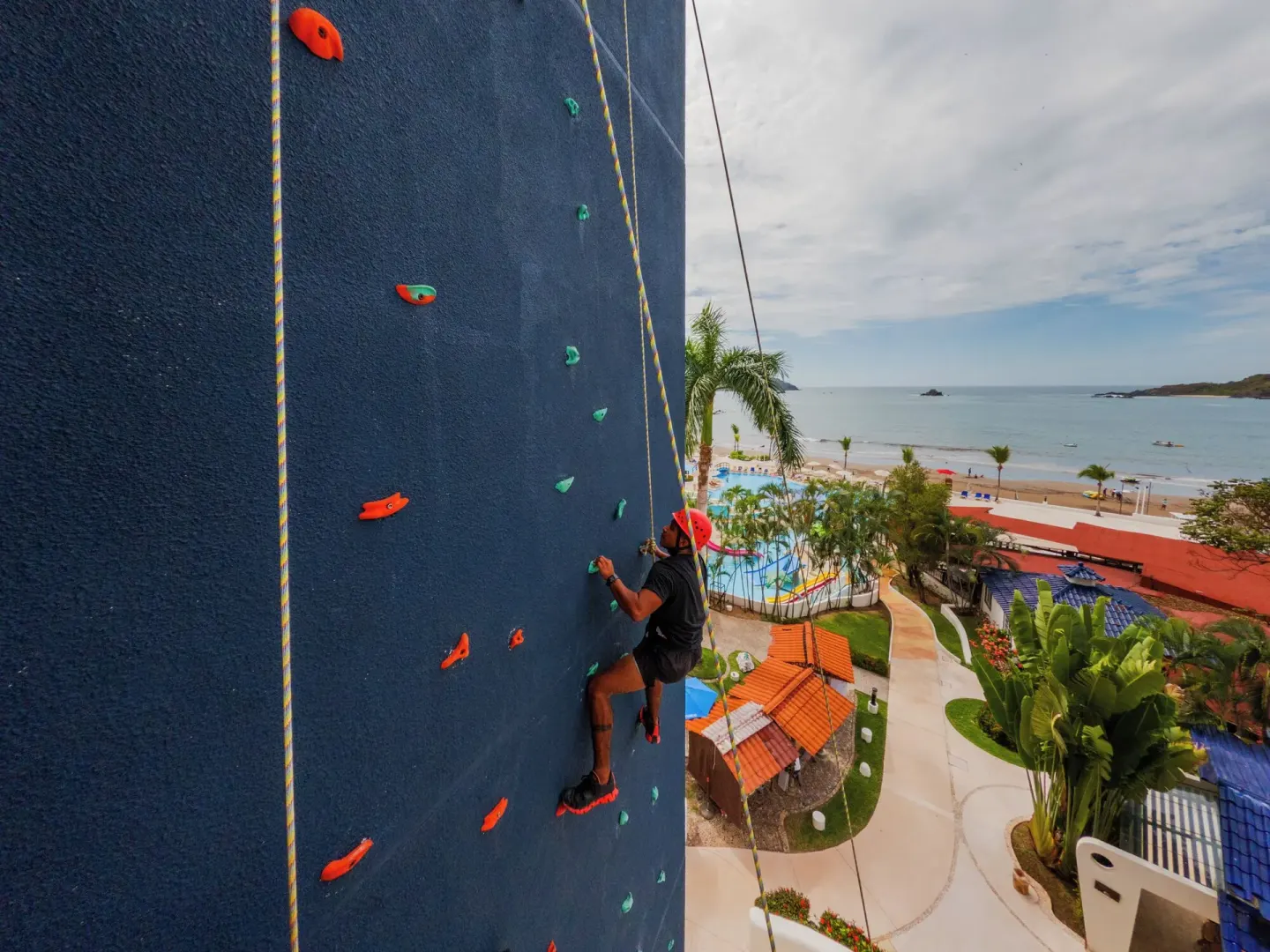 Outdoor climbing wall overlooking the beach at Hotel Azul Ixtapa Grand Resort Spa.