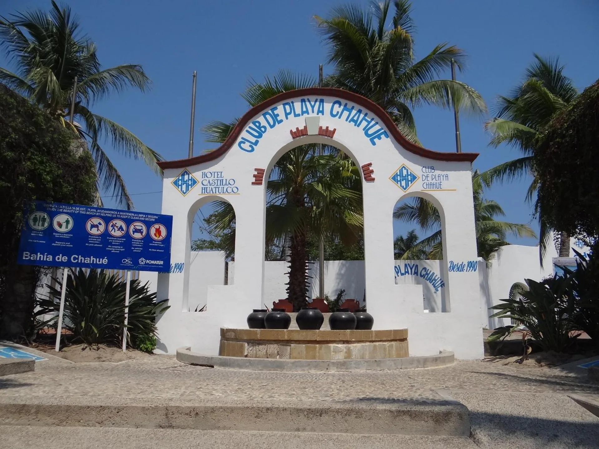 Club de Playa Chahué entrance arch for Hotel Castillo Huatulco & Beach Club.