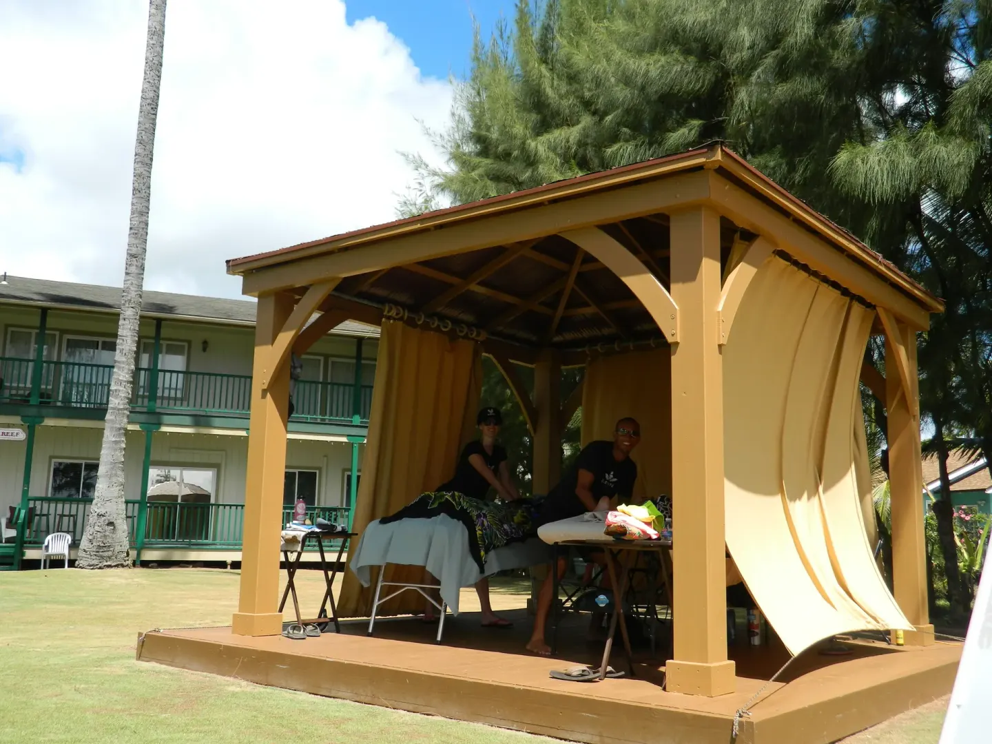 Outdoor massage cabana on the lawn at Hotel Coral Reef.