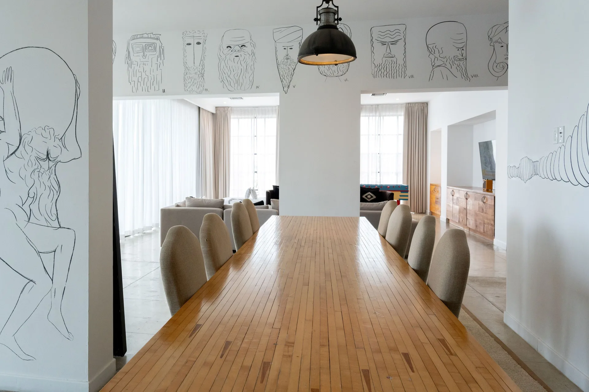 Captain's Suite dining table and wall drawings at Hotel El Ganzo.