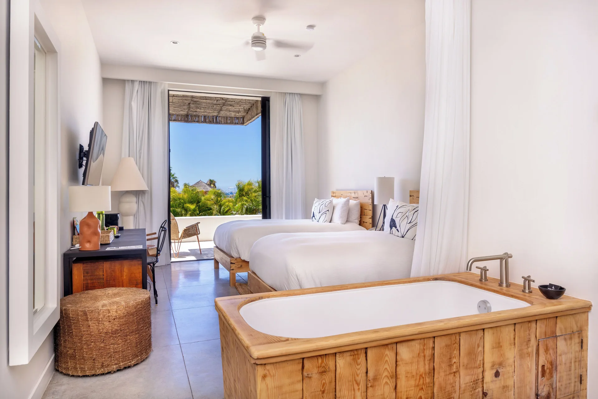 Large Suite Two Bedroom at Hotel El Ganzo with soaking tub and private terrace overlooking San José del Cabo marina.