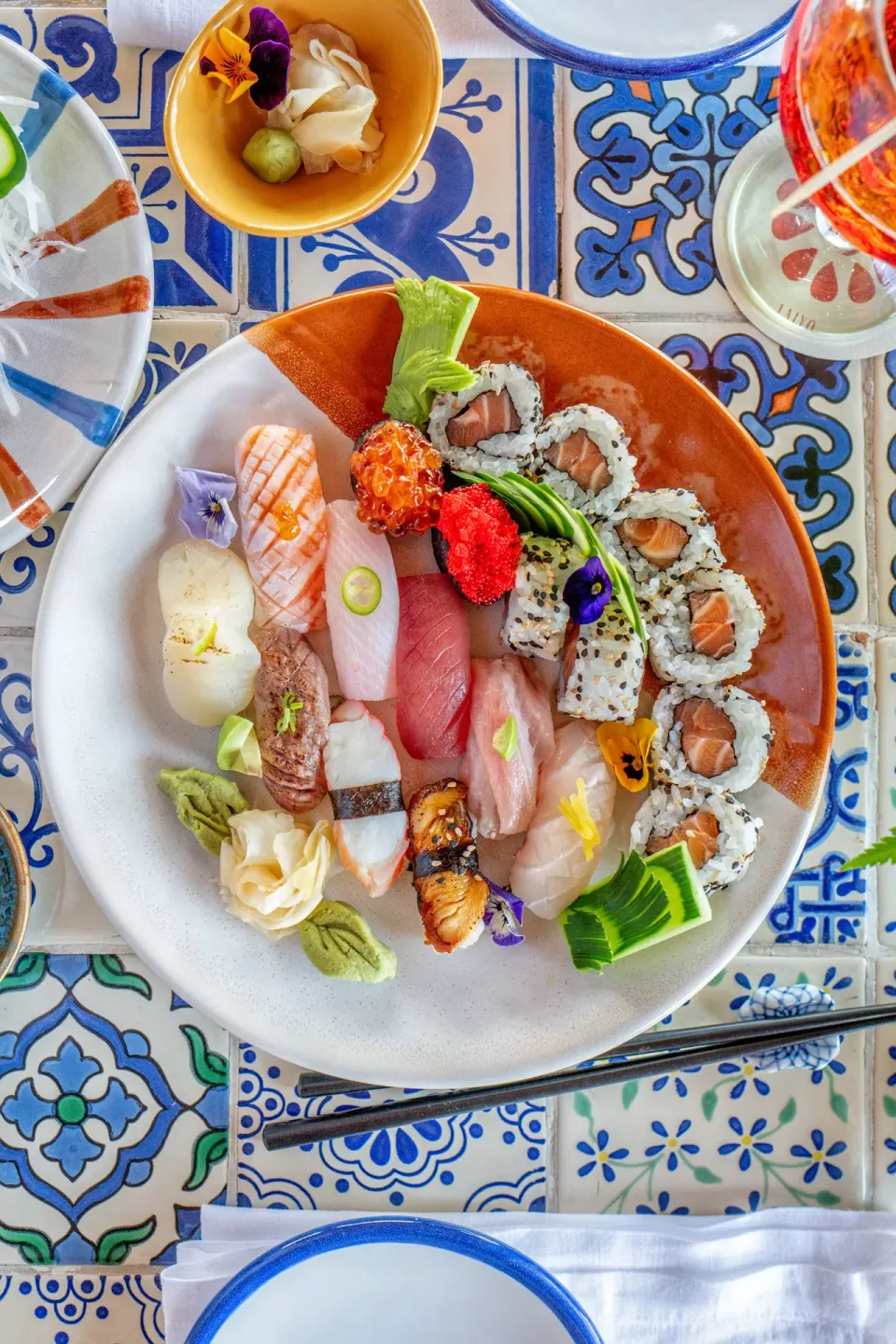 Assorted nigiri and rolls on a plate at Hotel Esencia