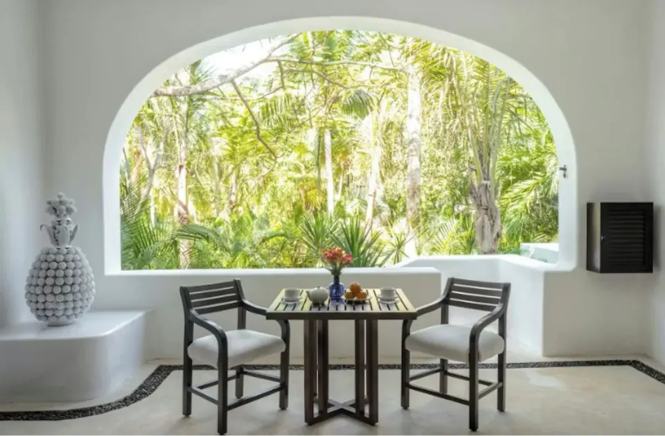 Arched terrace dining alcove overlooking jungle in Master Jungle Suite at Hotel Esencia
