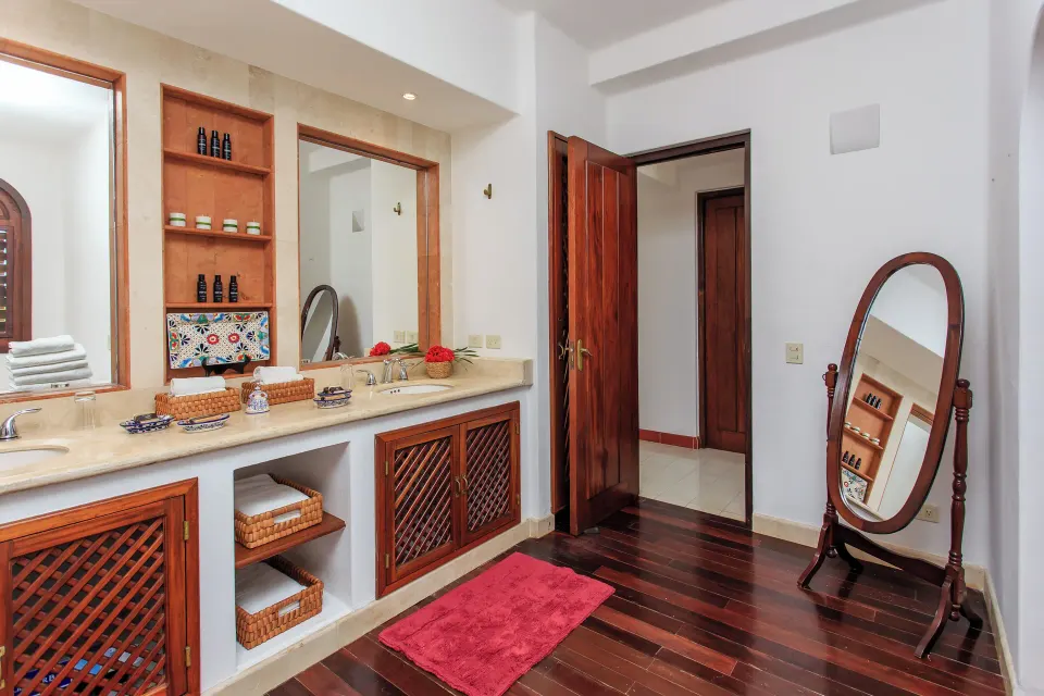 Villa double-sink bathroom vanity with mirror and wooden floors at Yum-Ha, Hotel Esencia.