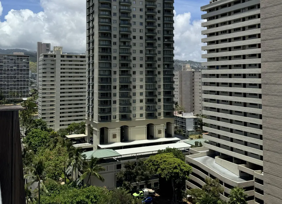 Penthouse Hoku Terrace ADA city view between high-rise buildings at Hotel La Croix.