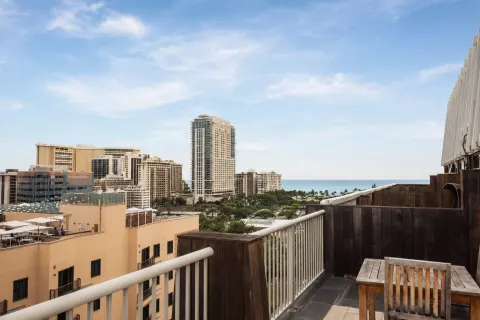Penthouse Hoku Terrace ADA balcony with city and ocean views at Hotel La Croix.