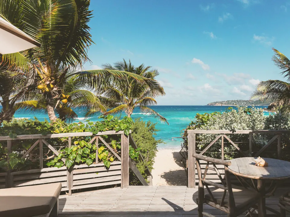 Junior Suite Beach View terrace steps leading toward the beach at Hotel Manapany.