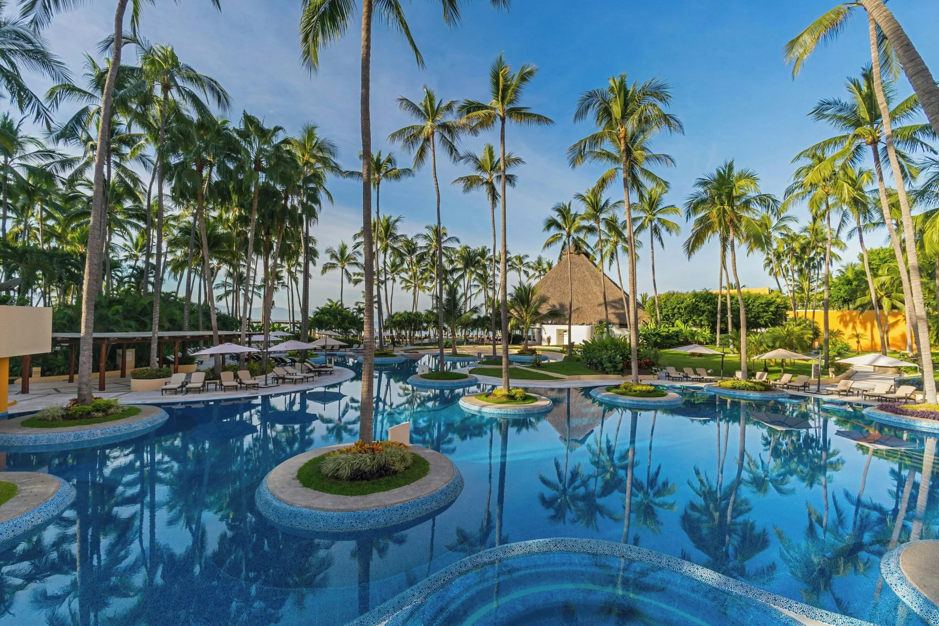 The Westin Playa Vallarta An All-Inclusive Resort beachfront hotel with palm-lined pools and bay views