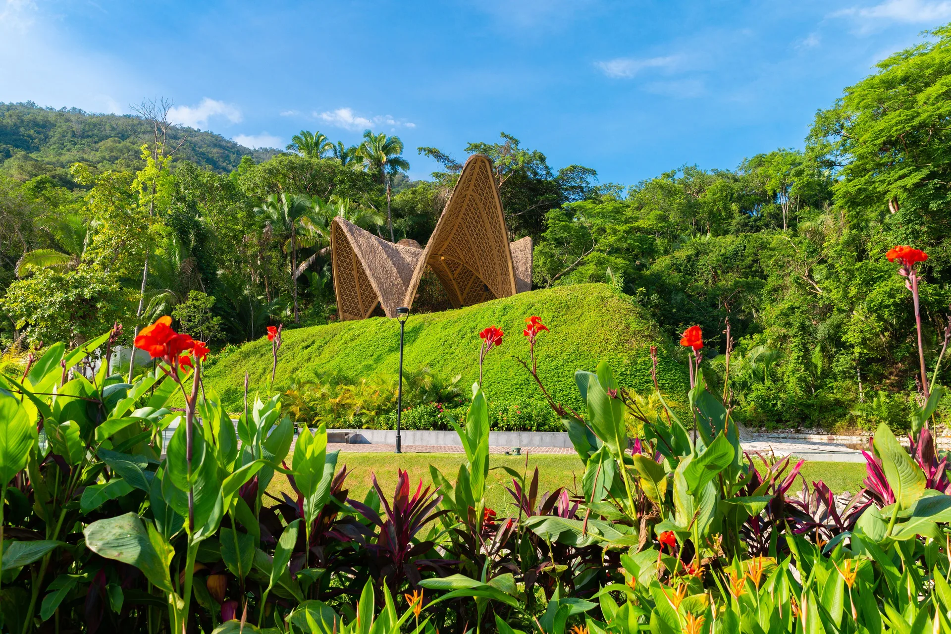 Tropical gardens and a sculptural pavilion at Hotel Mousai Puerto Vallarta.