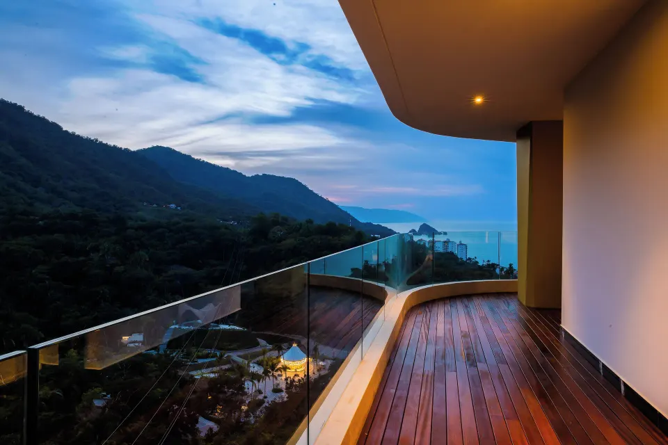 Corner Suite balcony with mountain and ocean view at Hotel Mousai Puerto Vallarta.