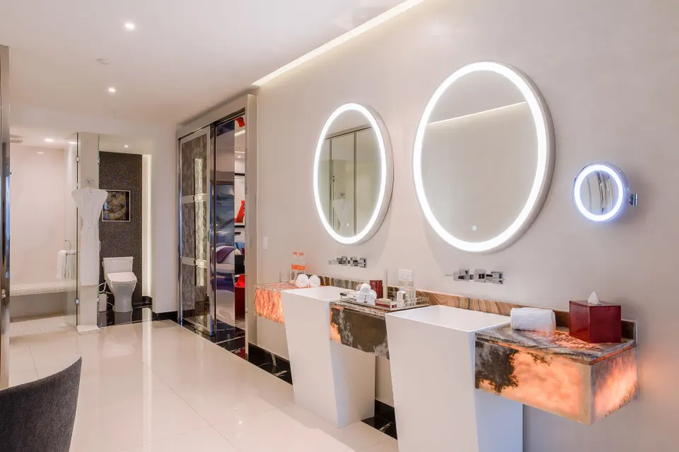 Ultra Two Bedroom Suite bathroom with double sinks at Hotel Mousai Puerto Vallarta.