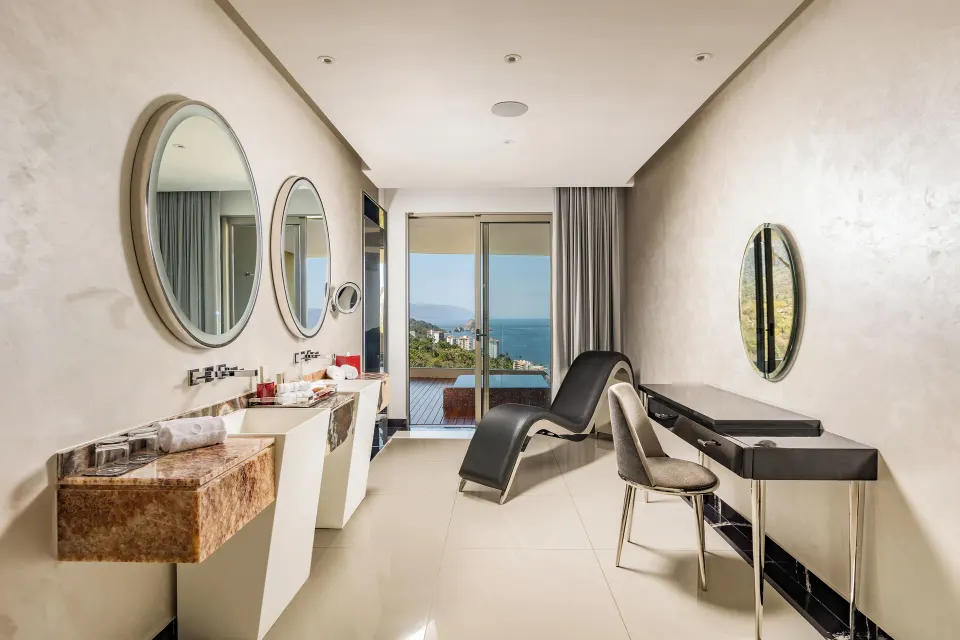 Ultra Two Bedroom Suite bathroom vanity with ocean-view doors at Hotel Mousai Puerto Vallarta.