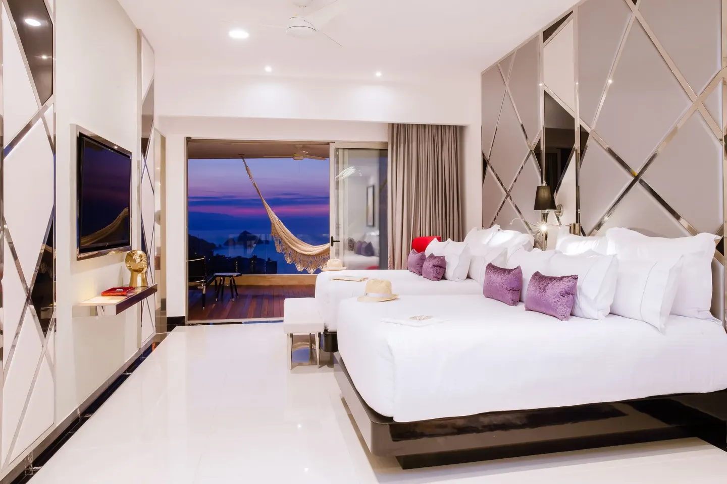 Ultra Two Bedroom Suite with king bed and balcony hammock at Hotel Mousai Puerto Vallarta.
