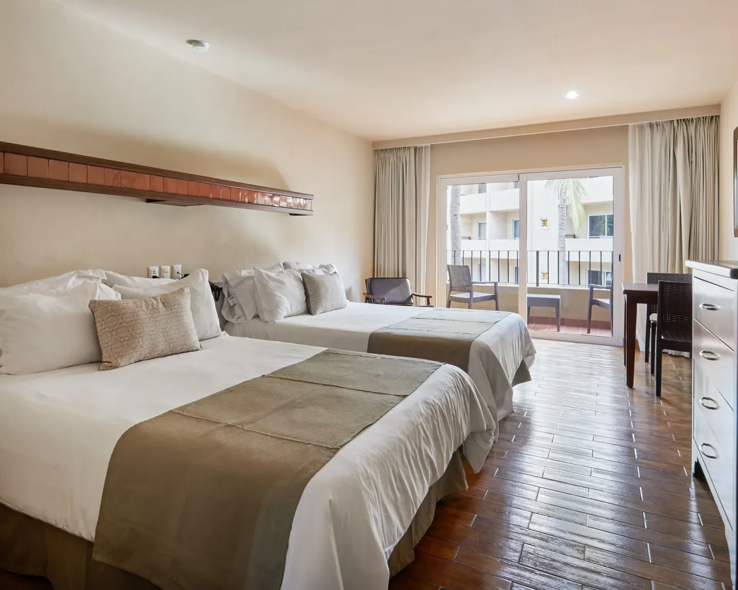 Standard room with two beds and balcony at Hotel Playa Mazatlan.