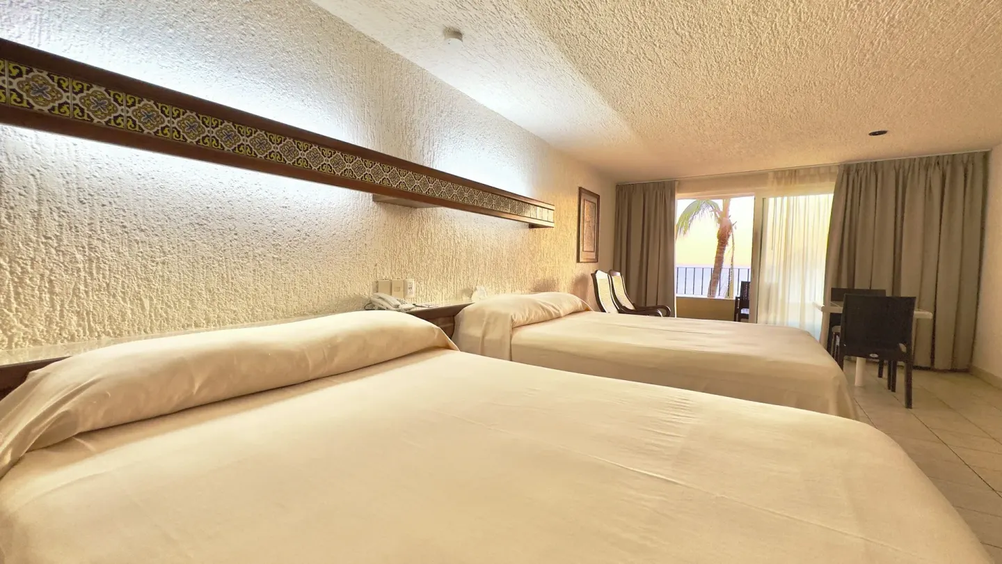 Wide view of a two-bed ocean view room at Hotel Playa Mazatlan.