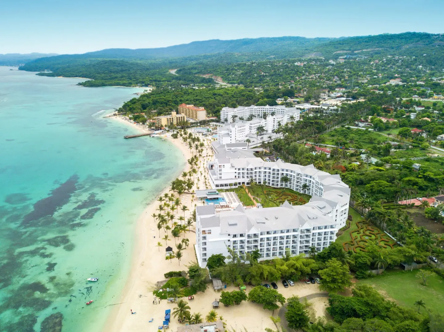 Aerial view of Hotel Riu Ocho Rios along the beach and coastline.