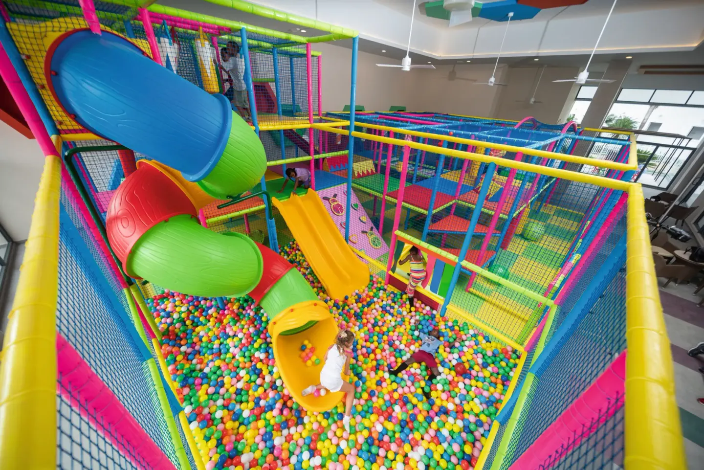 Indoor soft play structure with slides and ball pit at Hotel Riu Ocho Rios.