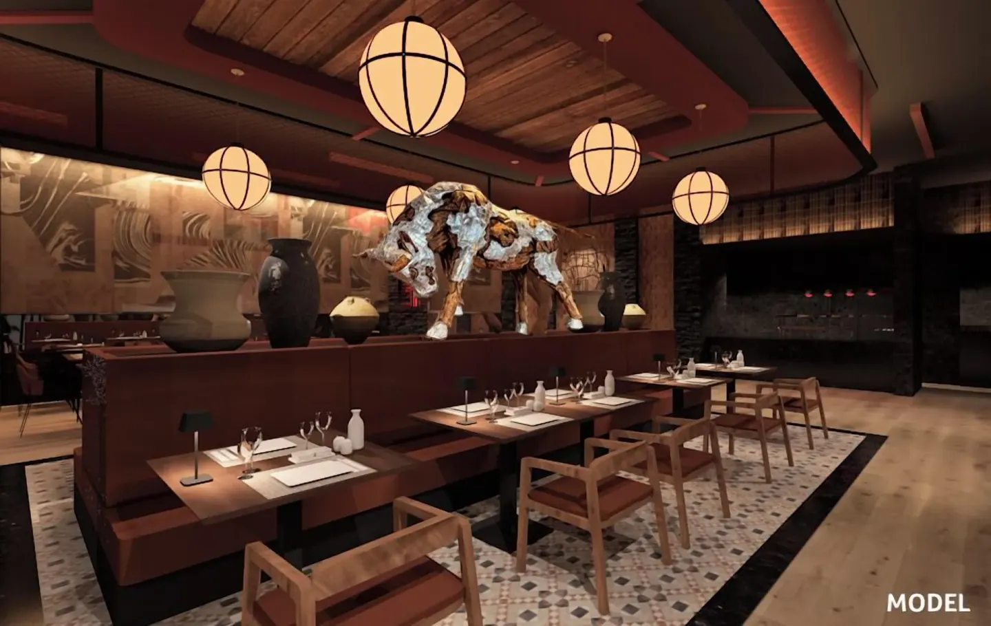 Steakhouse-style dining room with a bull sculpture at Hotel Riu Palace Aruba.