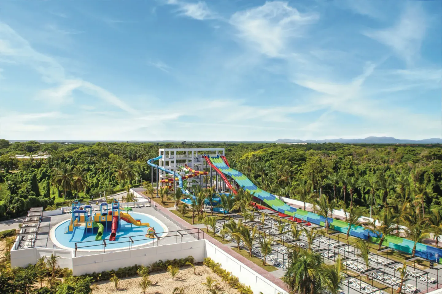 Aerial view of the water park slides and splash area at Hotel Riu Palace Bavaro.