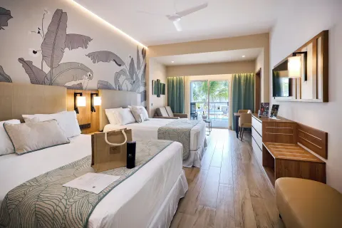 Elite Club Superior Junior Suite with two beds and balcony at Hotel Riu Palace Bavaro.